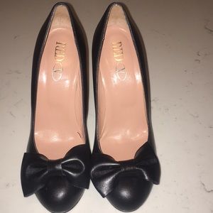 Red Valentino black leather bow heels